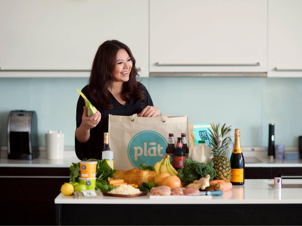 Woman with groceries delivered by Plat