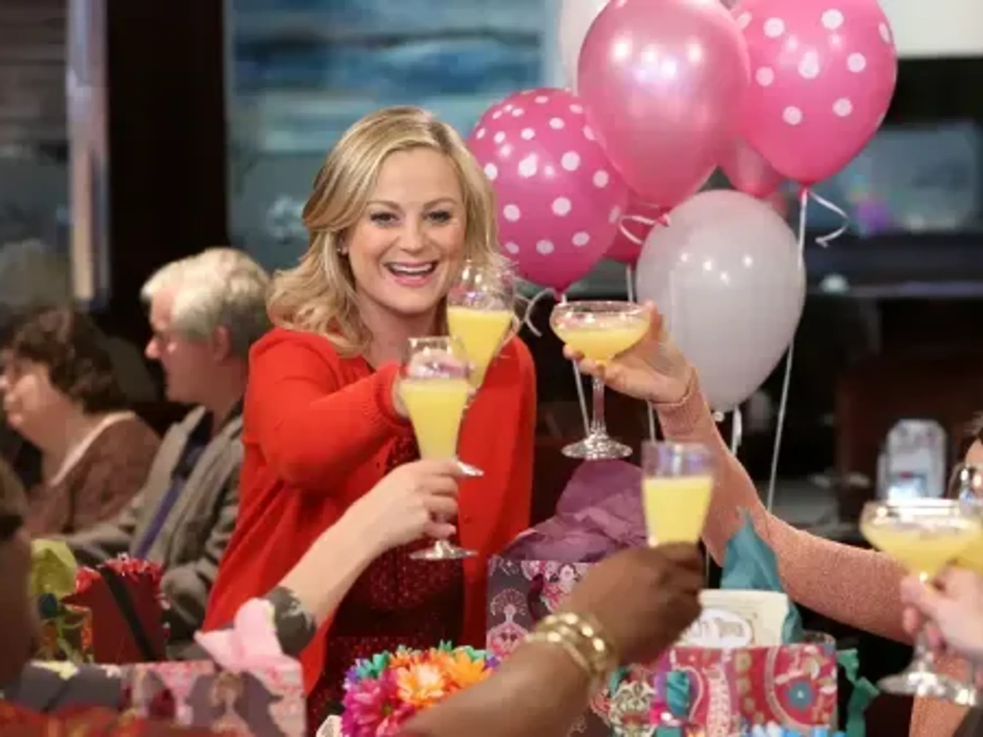 women with mimosas celebrating Galentine's Day
